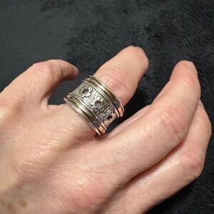 Sterling Silver Statement “Spinner” Ring in with 2, 10kt ‘Rose/Pink’ Gold Bands.